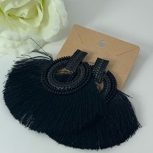 Black tassel style earrings
